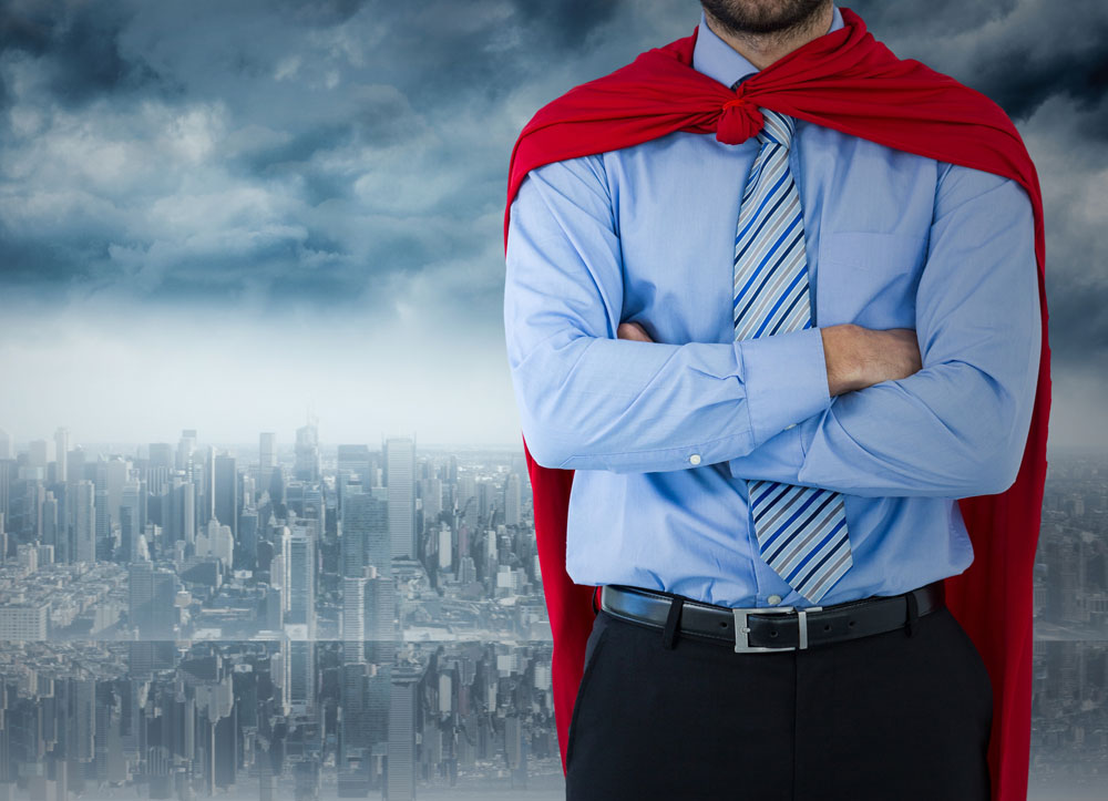 Business man with a super hero cape